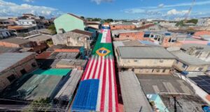 Com bandeirinhas e pinturas, ruas de Manaus se transformam para jogos do Brasil na Copa do Mundo